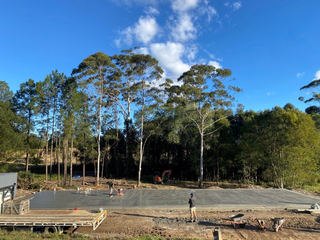 Large concrete shed slab being poured for a residential project on the Sunshine Coast